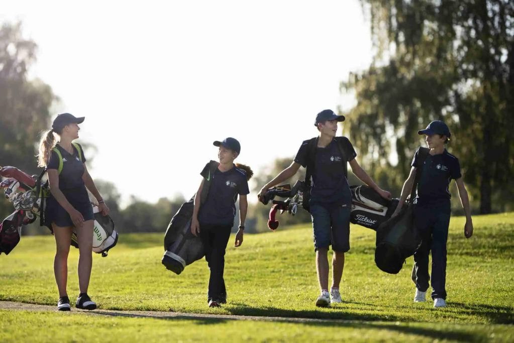 Students Enjoying Their Time on the School's Golf Course